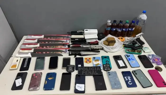 Prestador de serviços é preso ao tentar levar armas, celulares e drogas para dentro de Penitenciária