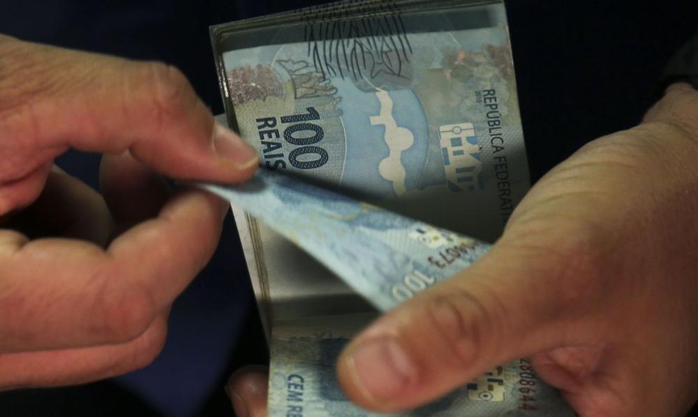 Economia Caixa paga Auxílio Brasil a cadastrados com NIS final 0